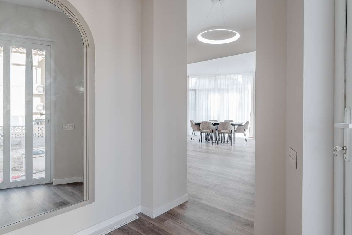 Bright hallway connecting the living and dining areas inside a modern new build villa in Calpe