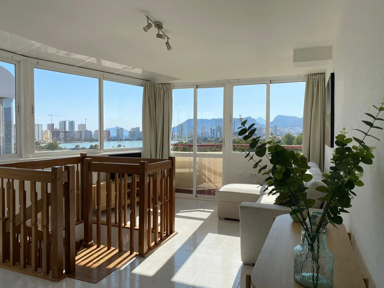 Bright living area with sea views at duplex penthouse in La Fossa, Calpe