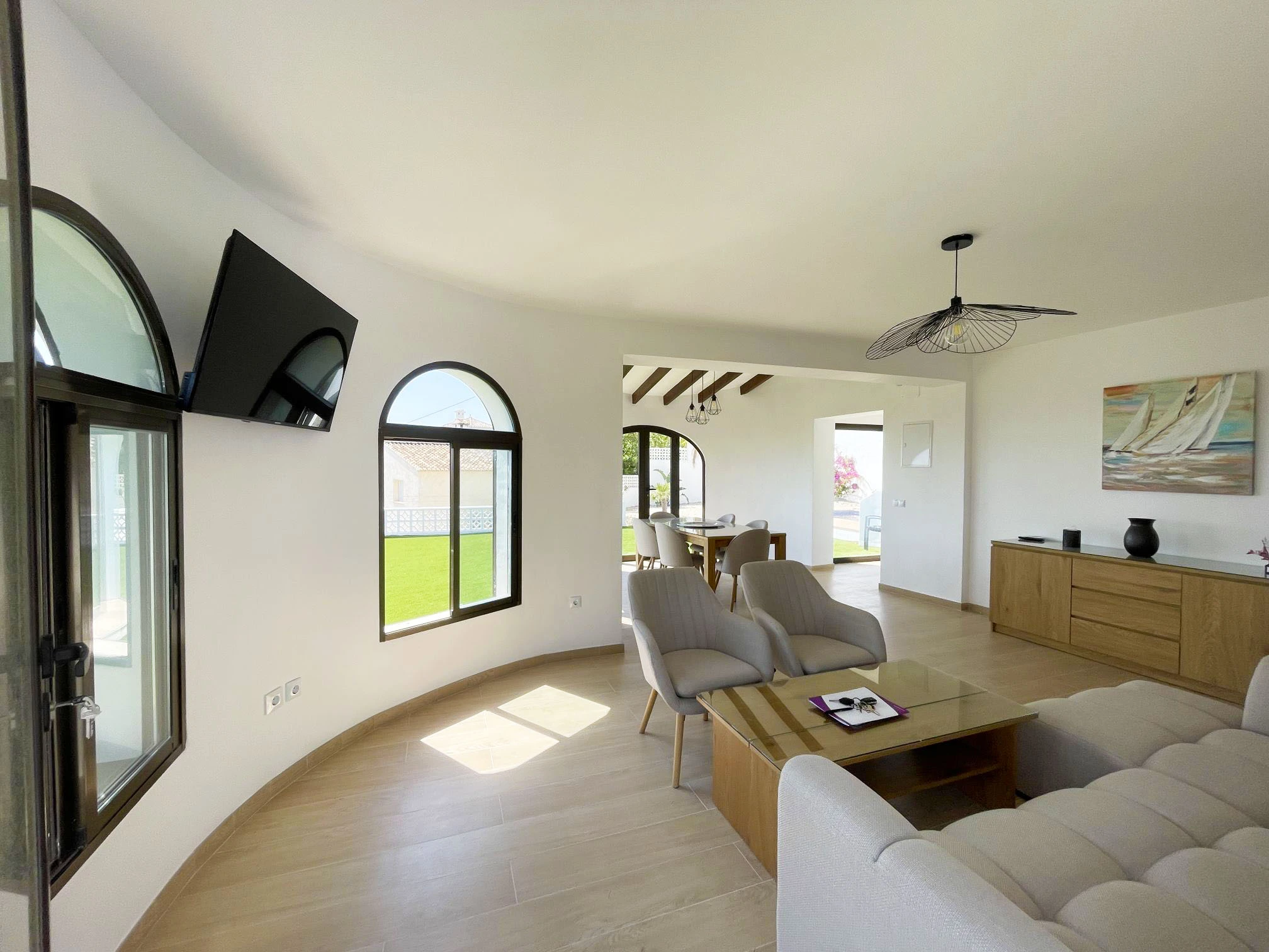 Bright living room and dining area at villa in Oltamar, Calpe