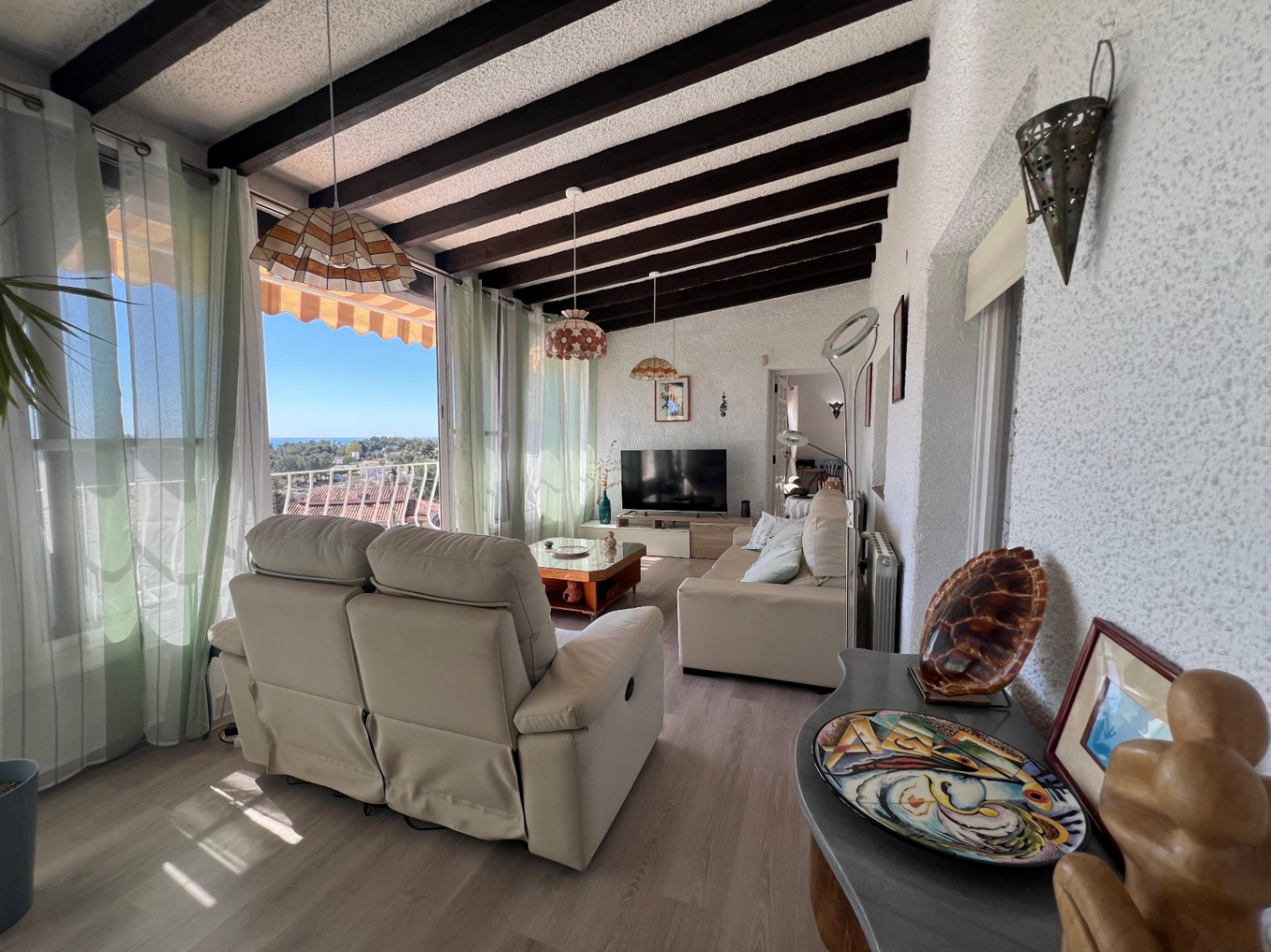 Bright living room with sea views at Mediterranean villa in Benissa