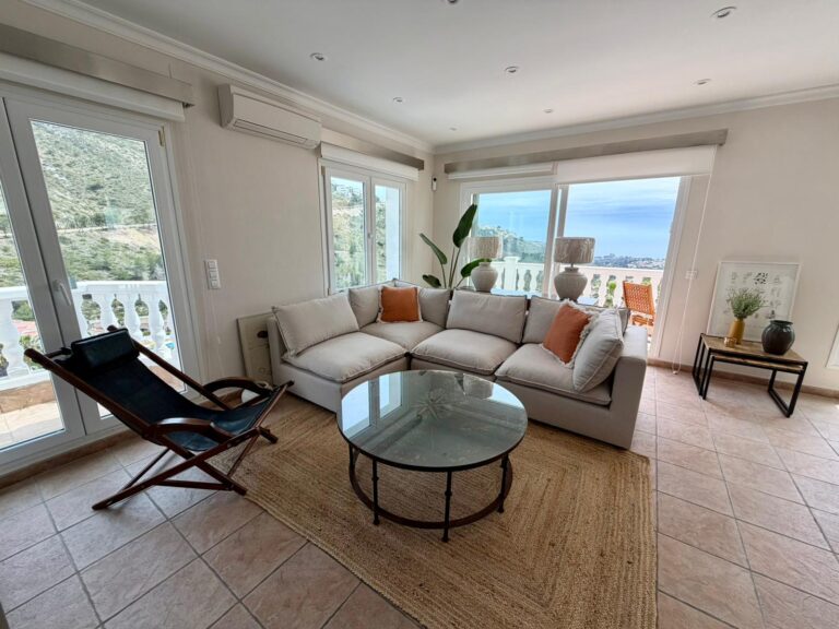 Bright living room with sea views at modern villa near El Portet Moraira