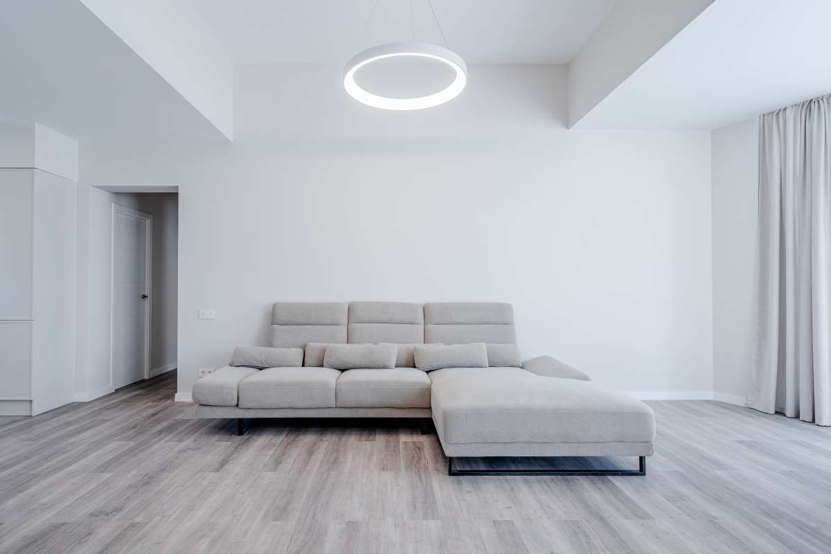 Bright lounge area with large sofa inside a new build three bedroom villa for sale in Calpe