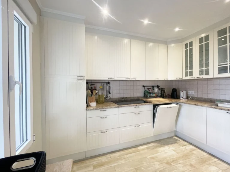 Bright open-plan kitchen at renovated villa in Calpe
