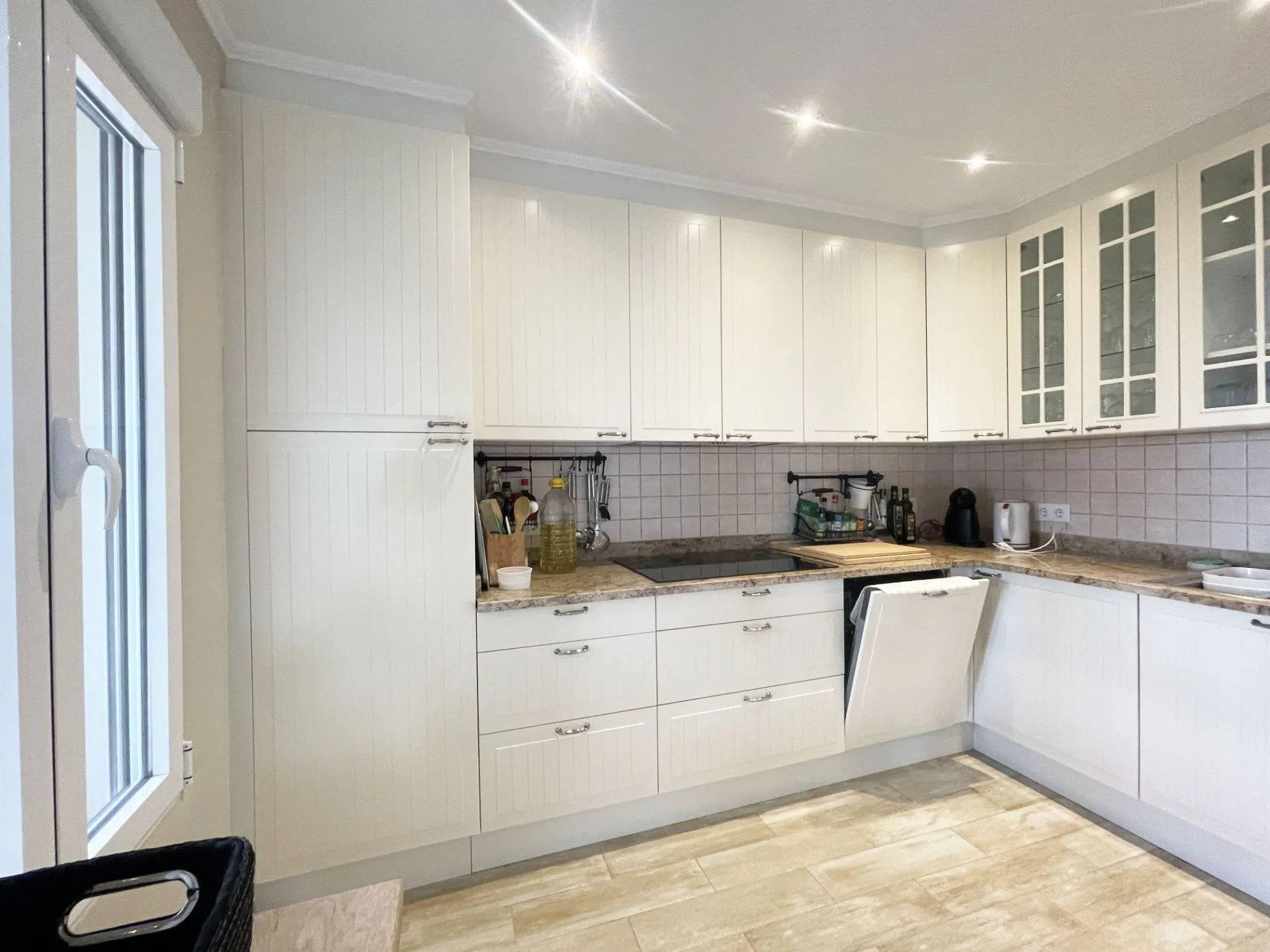 Bright open-plan kitchen at renovated villa in Calpe