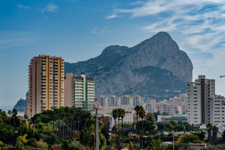 Close view of the Peñón de Ifach and Calpe skyline from a villa in a residential area
