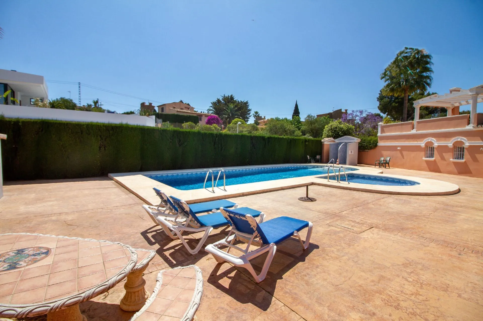 Communal pool and sun terrace near bungalow in La Vallesa Calpe