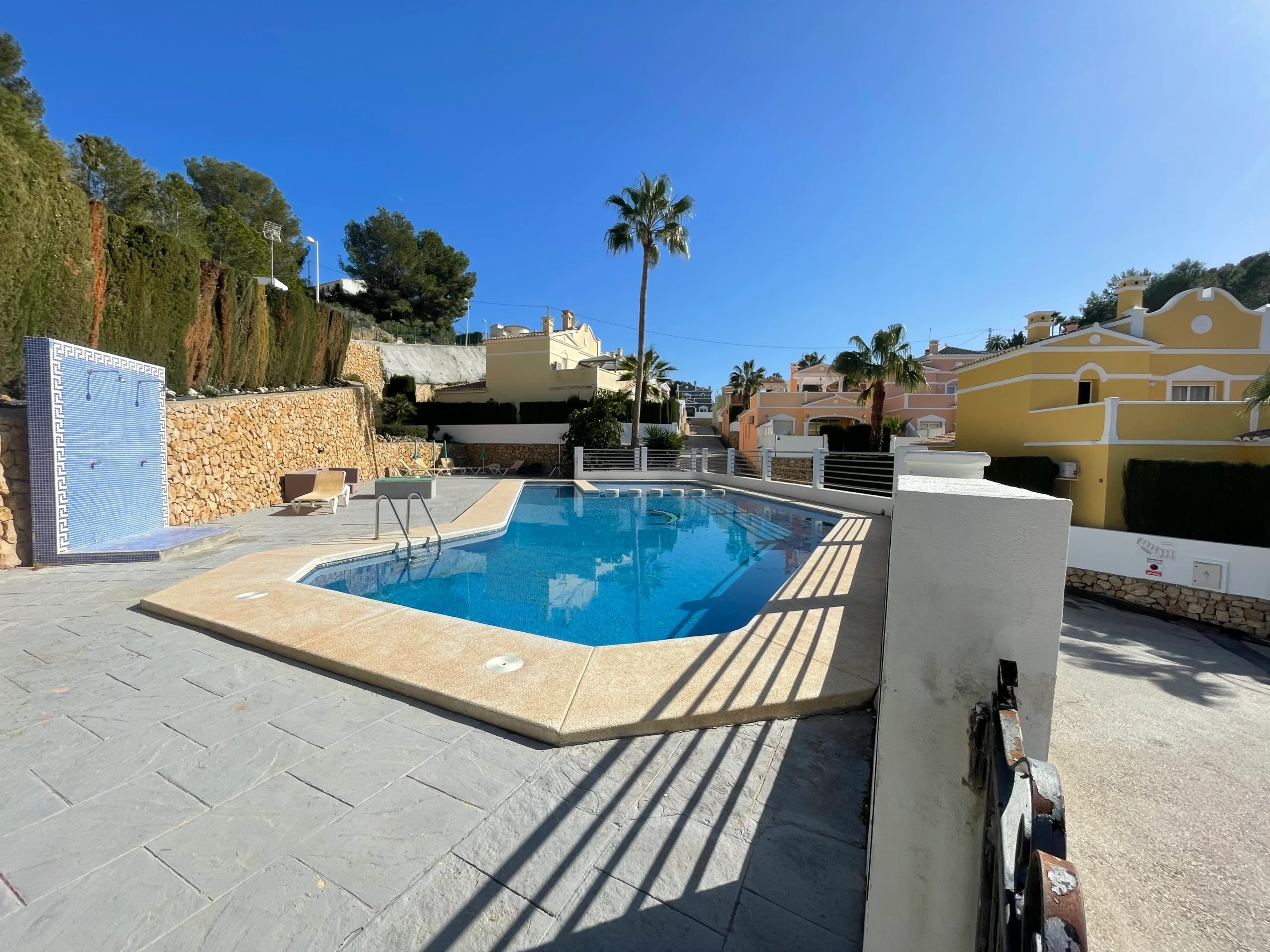 Communal pool area at bungalow complex in Cometa III, Calpe