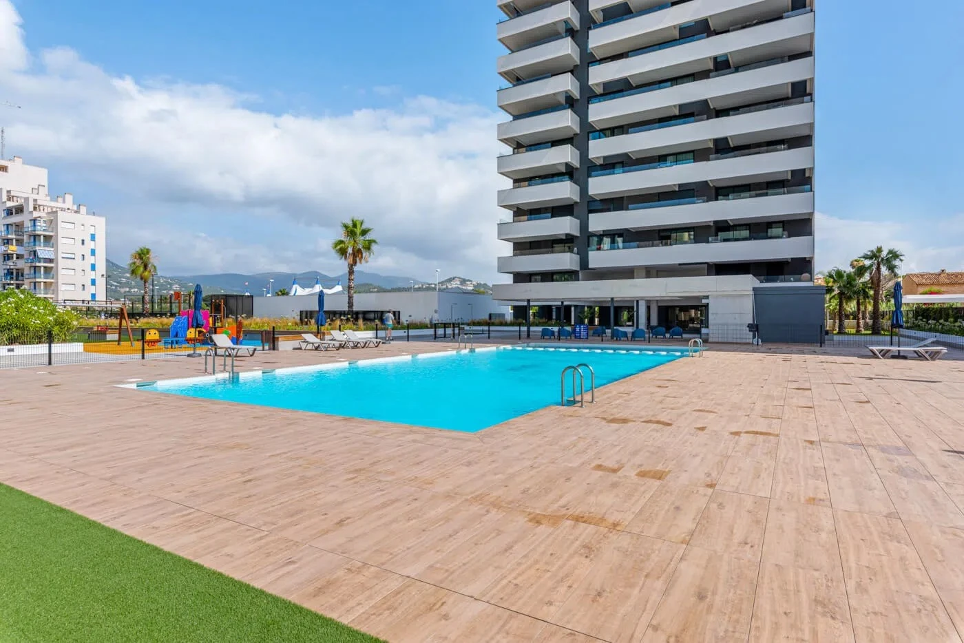 Communal pool at modern apartment complex in Arenal-Bol, Calpe