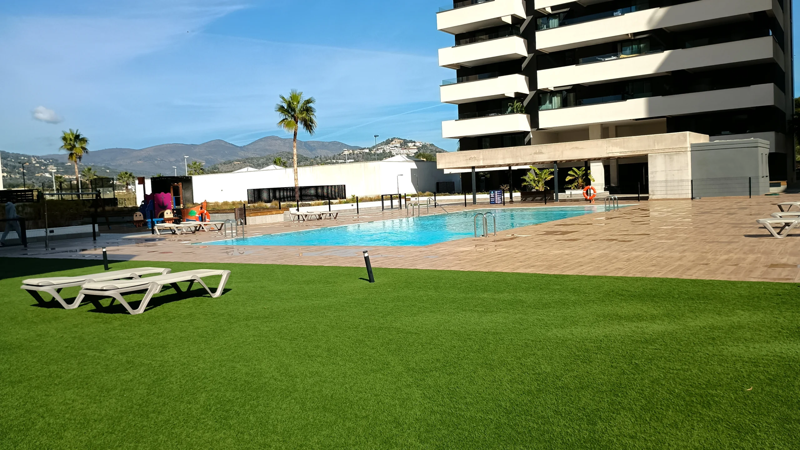 Communal swimming pool at luxury penthouse complex in Calpe