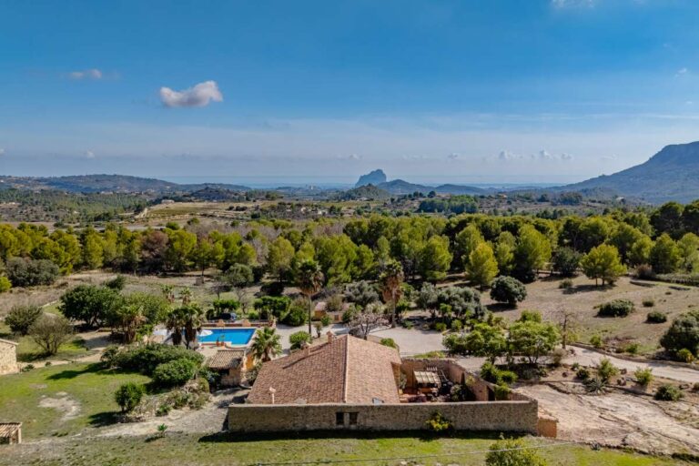Countryside views from a historic finca in Benissa overlooking Mediterranean gardens, valley landscape and the Peñón de Ifach in the distance