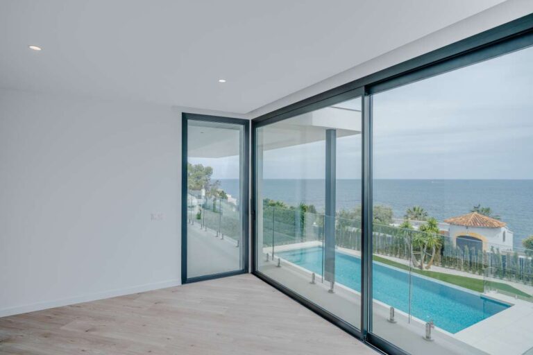 Covered terrace at a modern second-line sea villa in La Calalga, Calpe with infinity pool views and Mediterranean Sea views