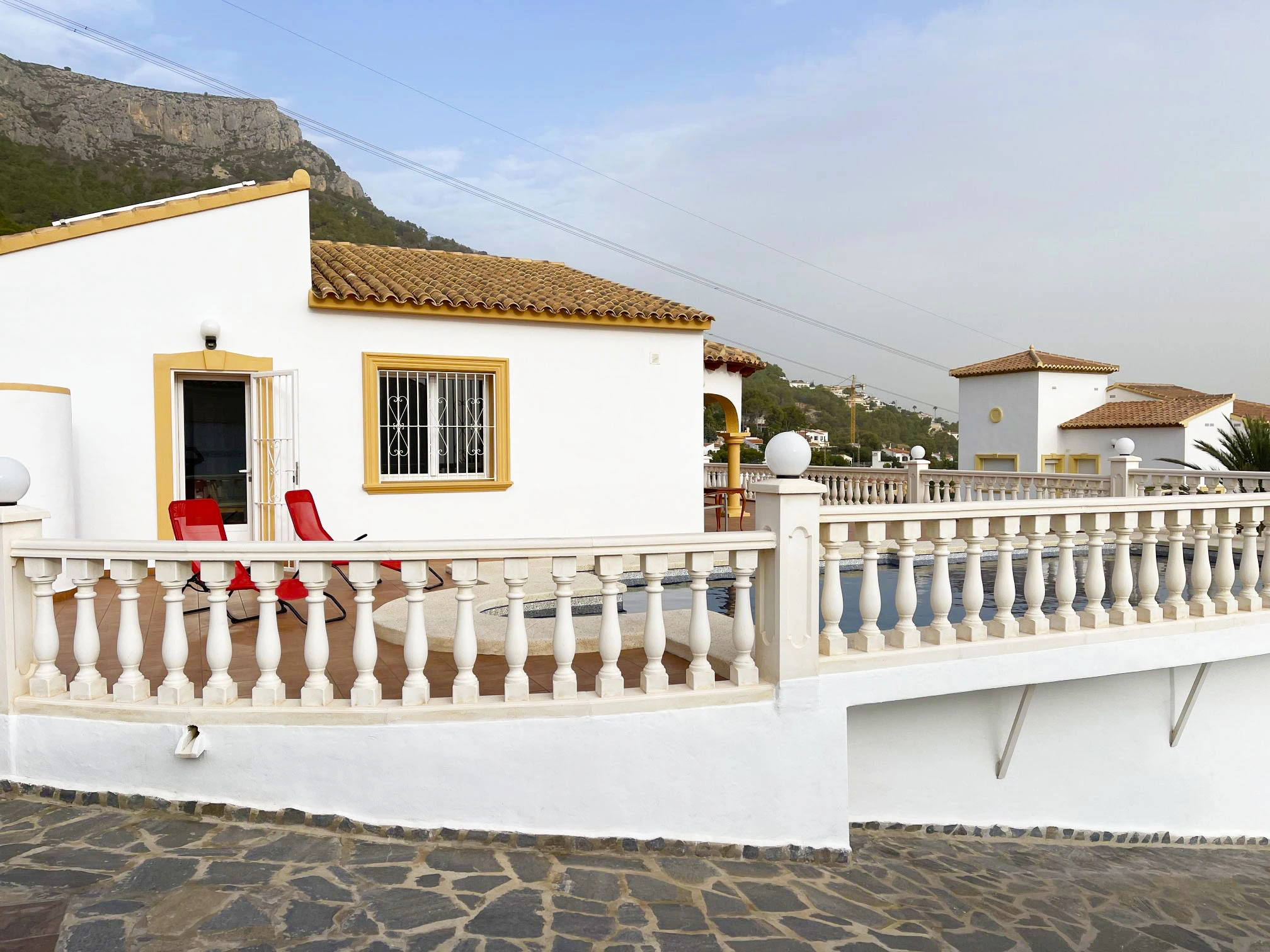 Detached villa exterior with terrace in elevated area of Calpe