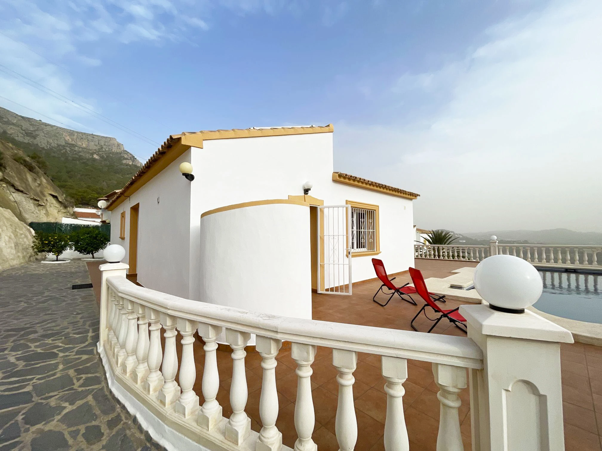 Detached villa terrace beside private pool in Calpe