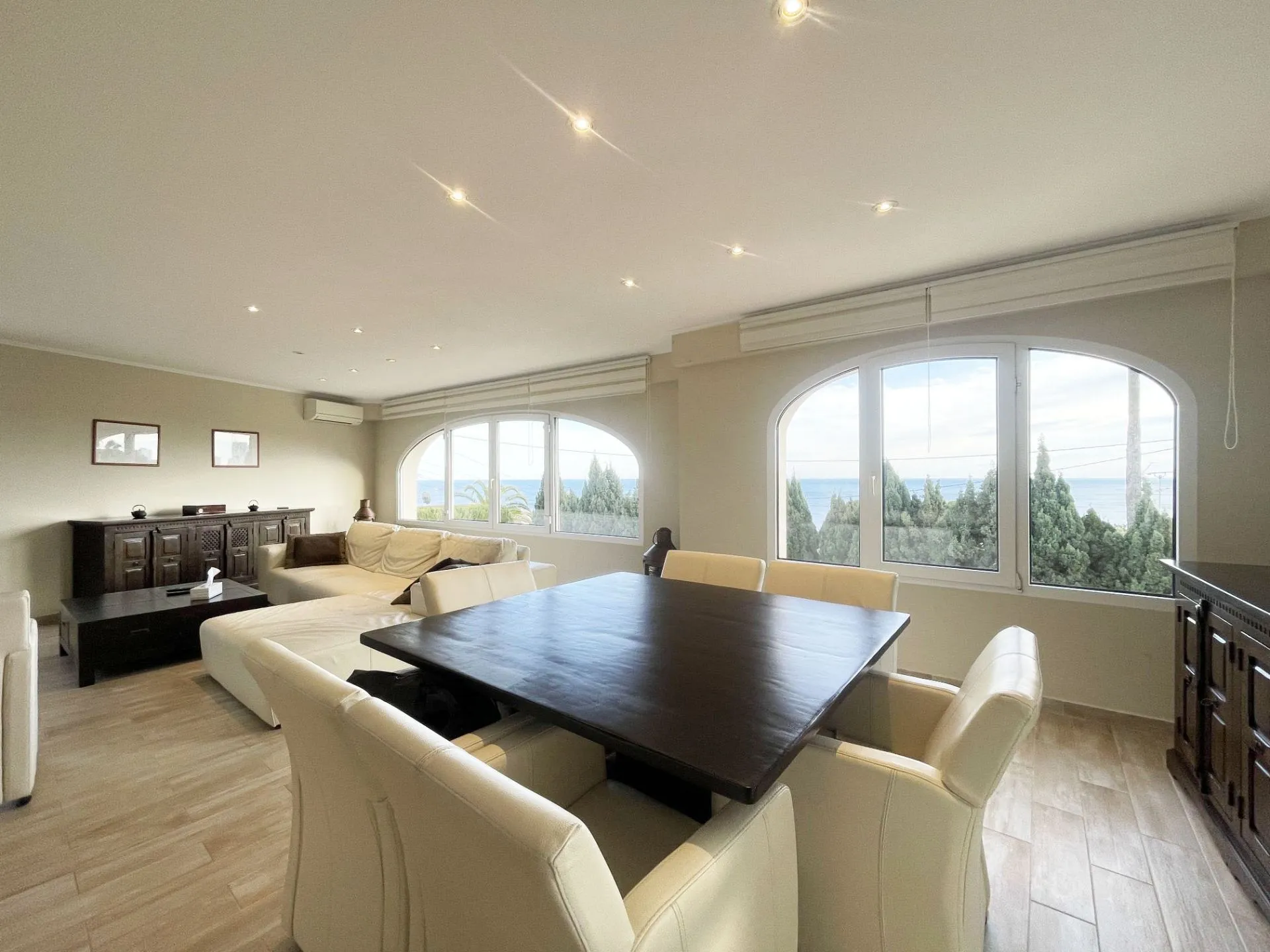 Dining and lounge area with sea views at renovated villa in Calpe