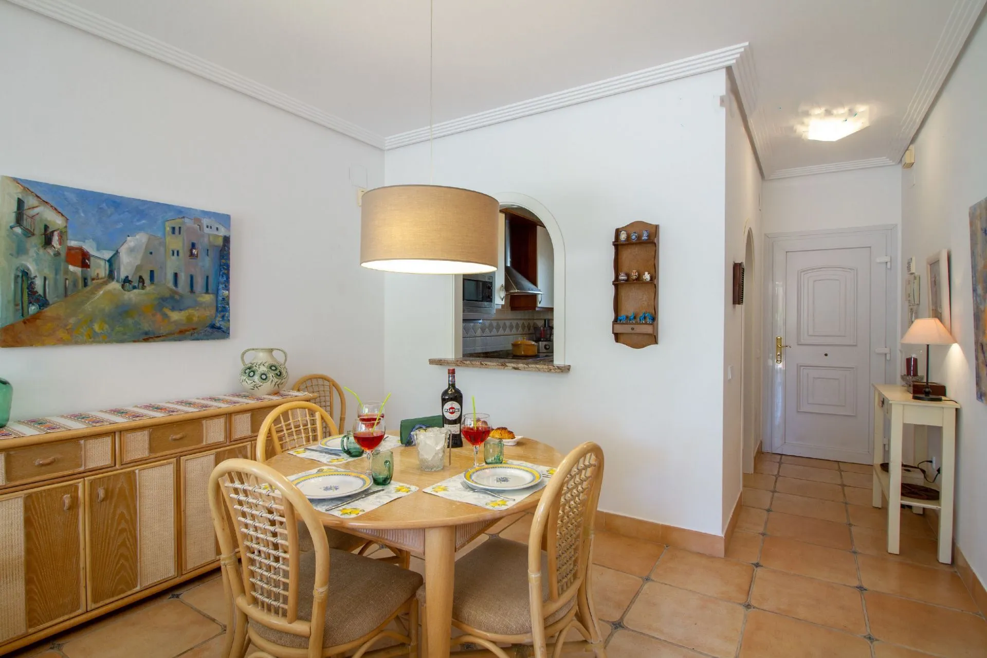Dining area and hallway inside 3-bedroom bungalow in La Vallesa Calpe