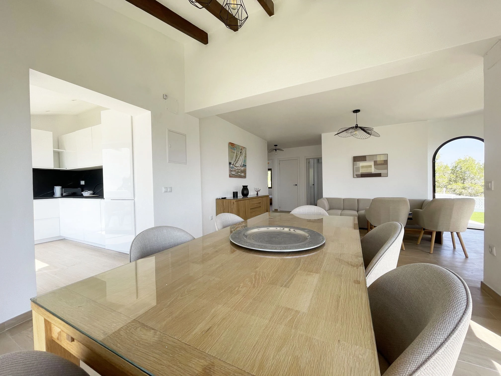 Dining room and kitchen inside villa in Oltamar, Calpe