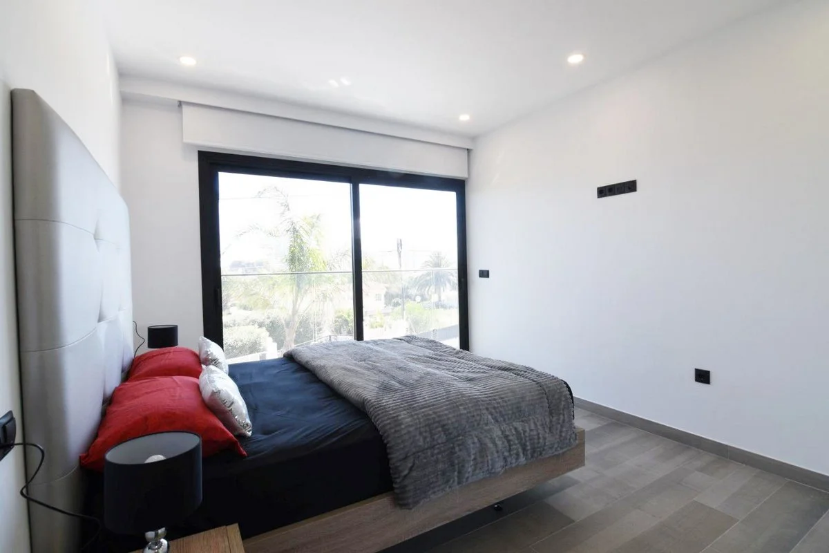 Double bedroom with balcony access in modern villa in Carrió, Calpe