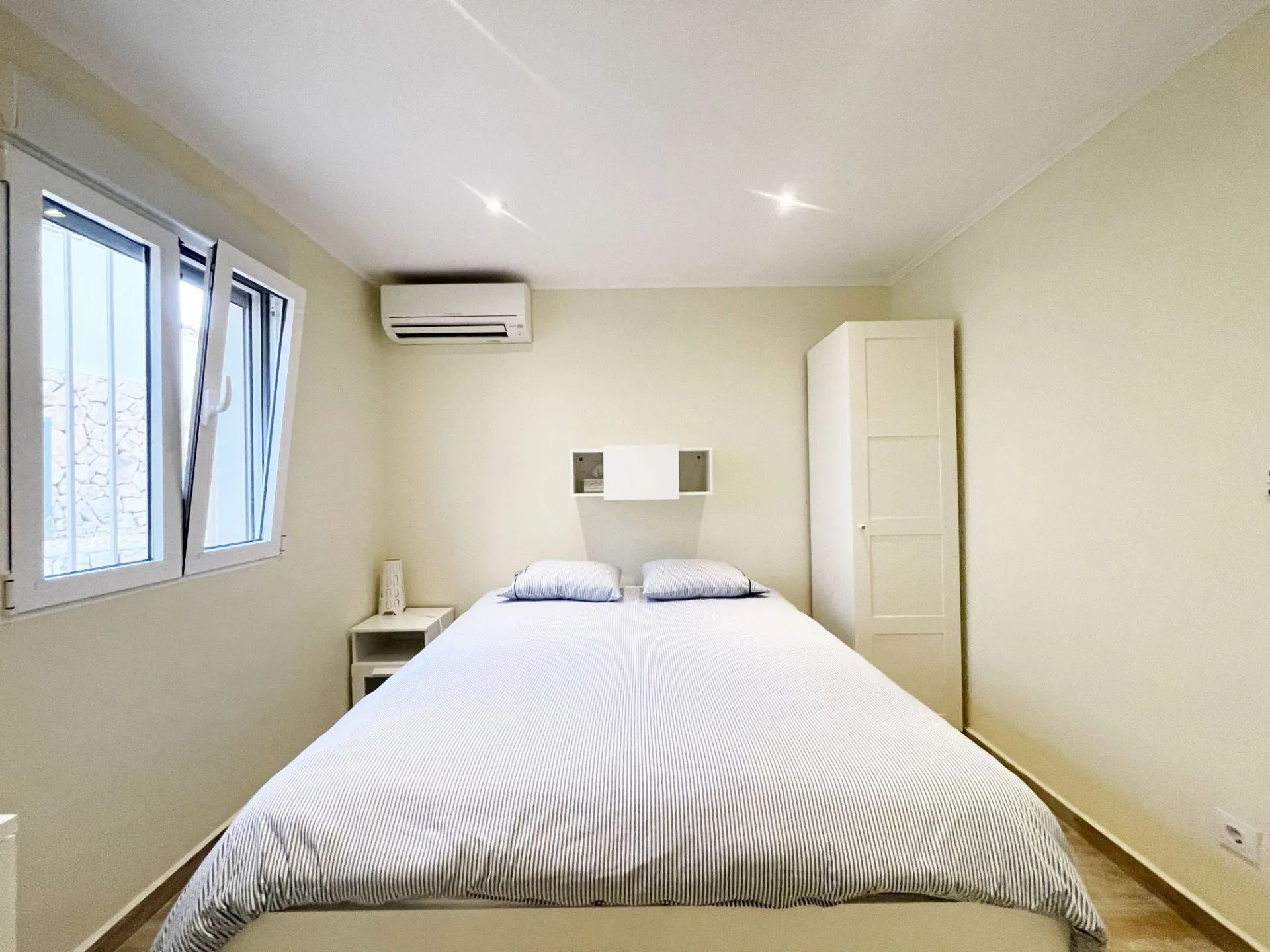Double bedroom with window at renovated villa in Calpe