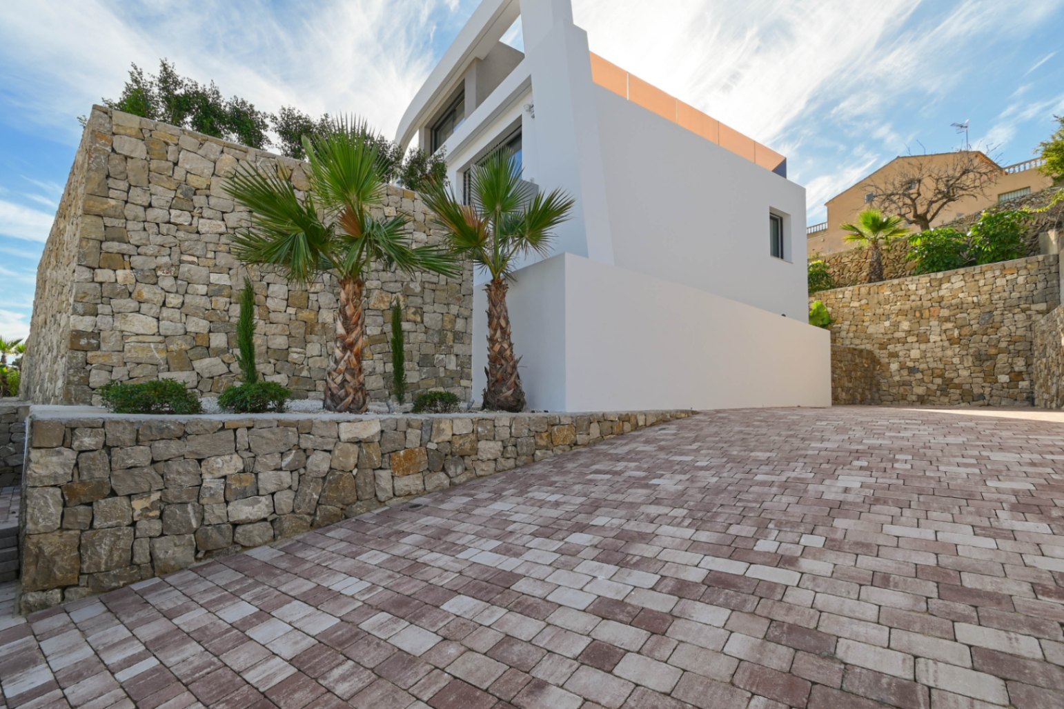 Driveway and automatic access area at luxury villa near La Fustera Beach