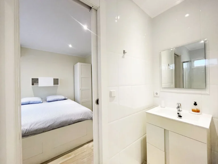 En-suite bathroom beside bedroom at renovated villa in Calpe