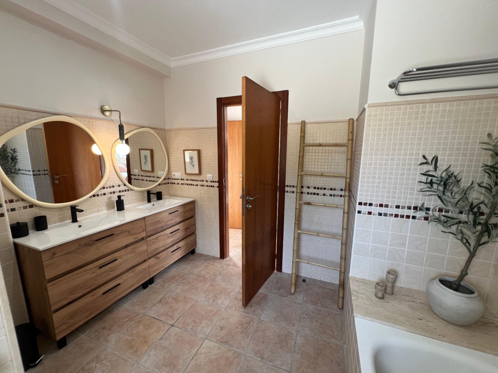 En-suite bathroom with double vanity at modern villa in Moraira