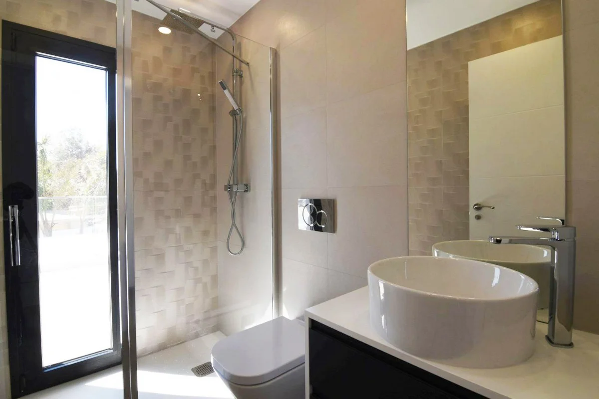 En-suite shower room with vanity in modern villa in Carrió, Calpe