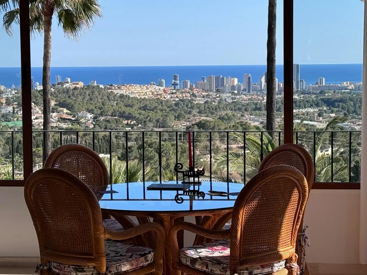 Enclosed terrace lounge with panoramic sea views from a Mediterranean villa in Empedrola, Calpe.