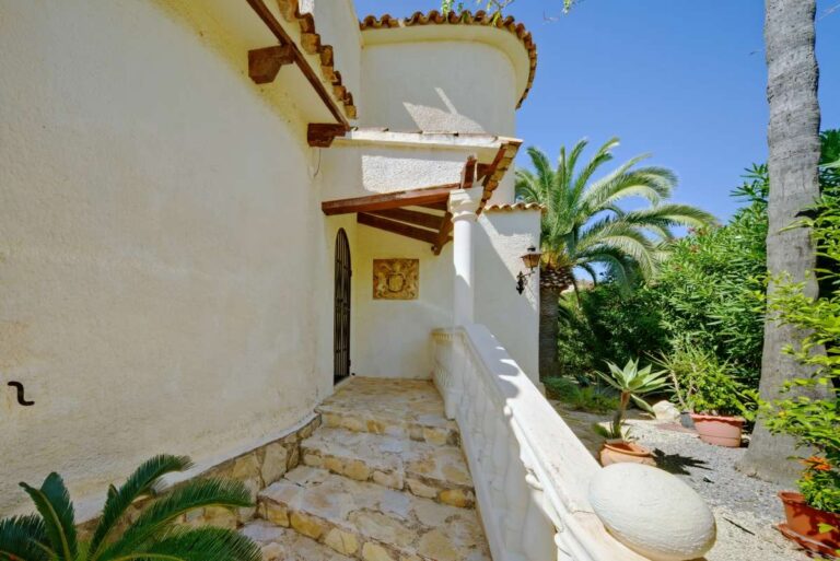 Exterior steps with Mediterranean planting beside a second line villa near Puerto Blanco in Calpe.