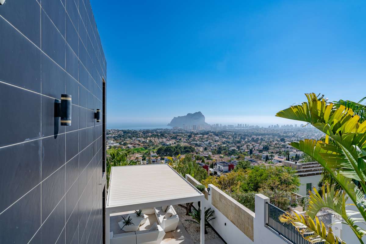 Exterior view towards the Peñón de Ifach and Calpe coastline from a luxury villa in Gran Sol.