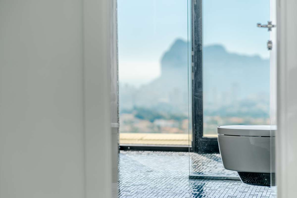 Freestanding bathtub with panoramic sea views inside the main suite of a luxury villa in Gran Sol, Calpe.