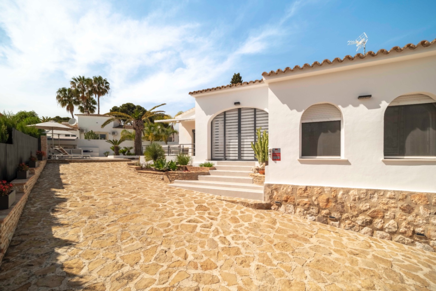Front terrace and exterior of renovated Ibiza-style villa in Calpe