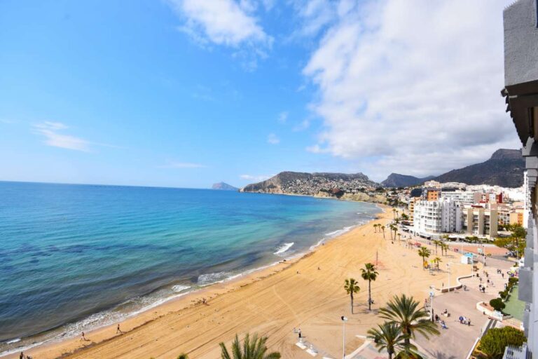 Frontline views over Arenal Beach, the Mediterranean Sea and Calpe coastline from a double penthouse in Calpe.