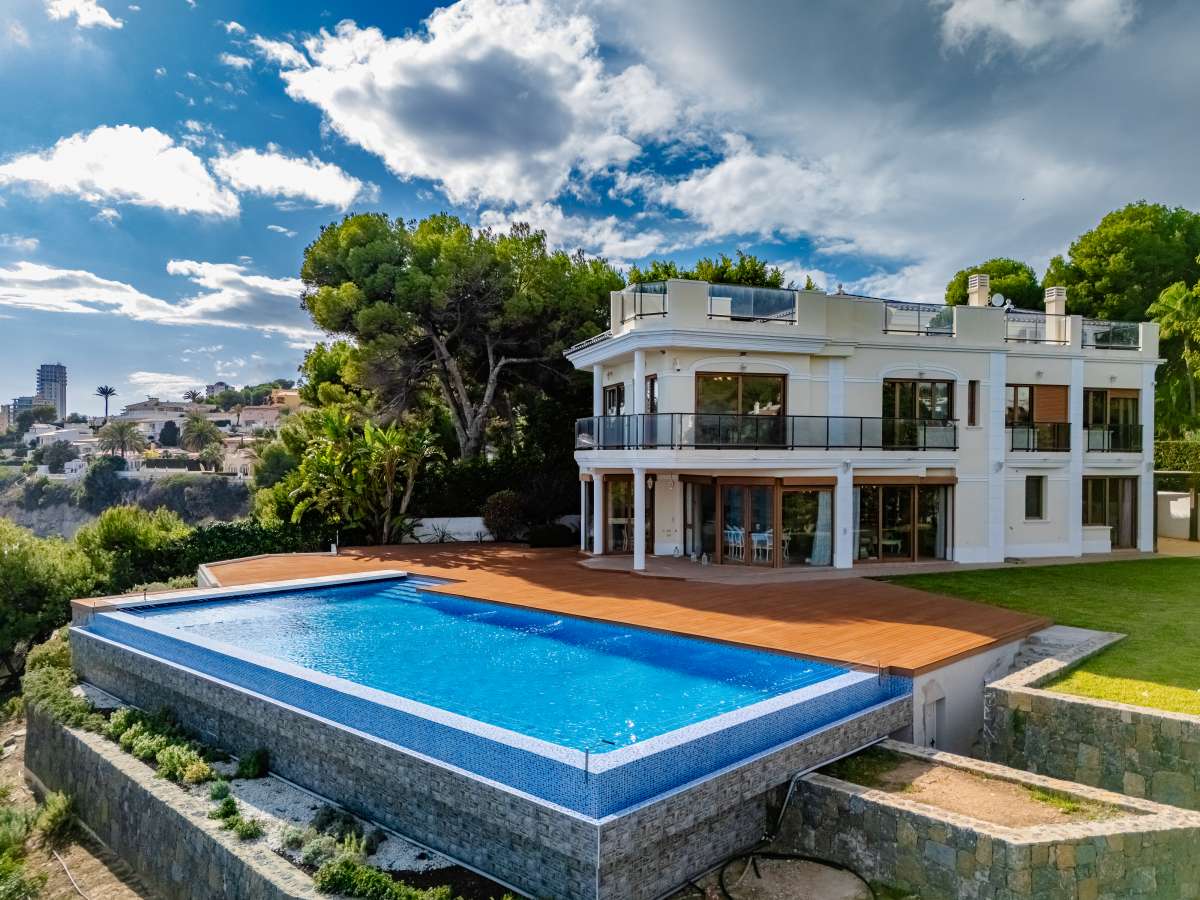 Frontline villa exterior with private swimming pool, sea views and terrace in Les Bassetes, Benissa Coast.