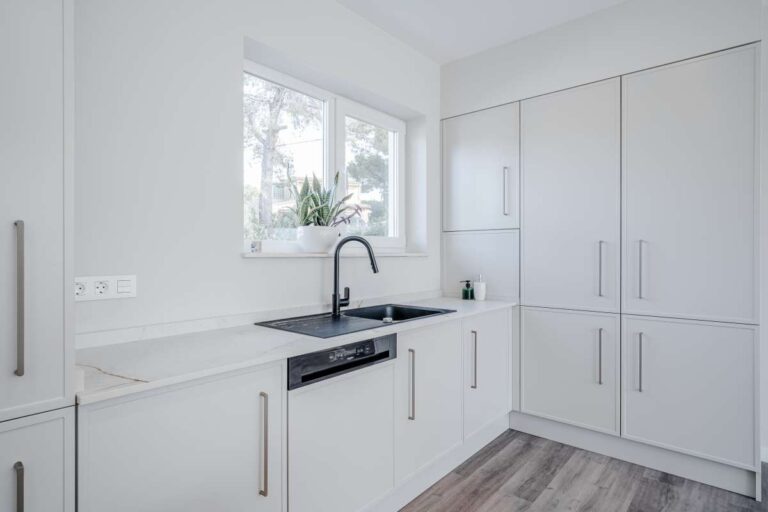Fully equipped white kitchen with modern appliances inside a new build villa near the coast in Calpe