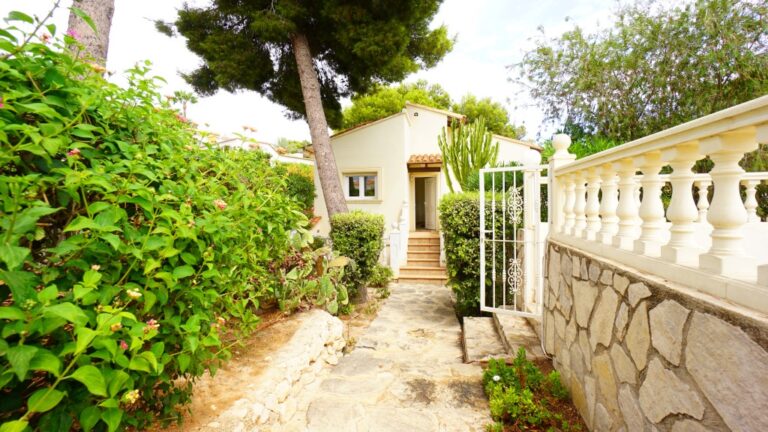 Garden pathway and entrance area at a villa in La Fustera, close to the sea in Benissa.