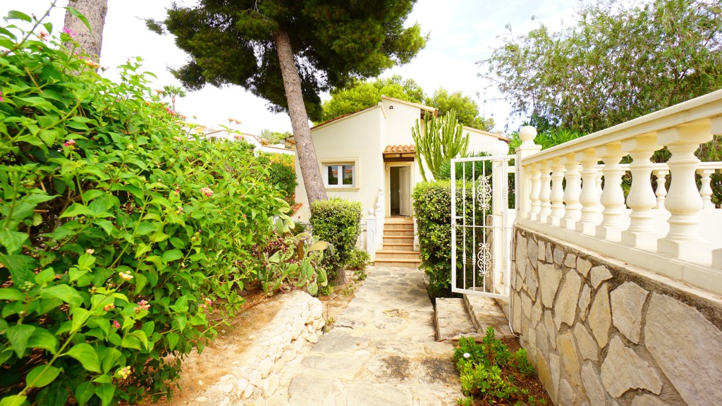 Garden pathway and entrance area at a villa in La Fustera, close to the sea in Benissa.