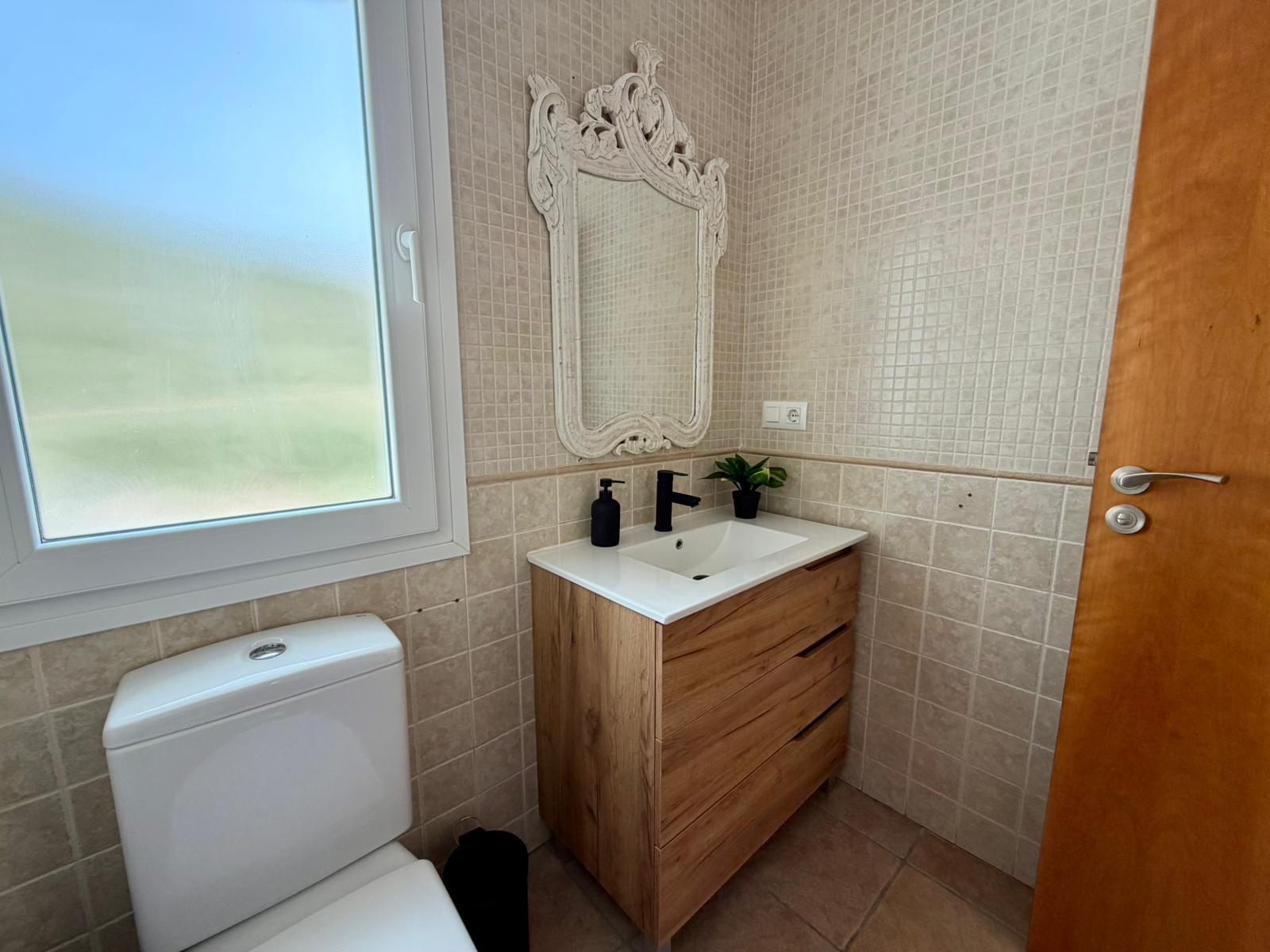 Guest bathroom at modern three-level villa in Moraira