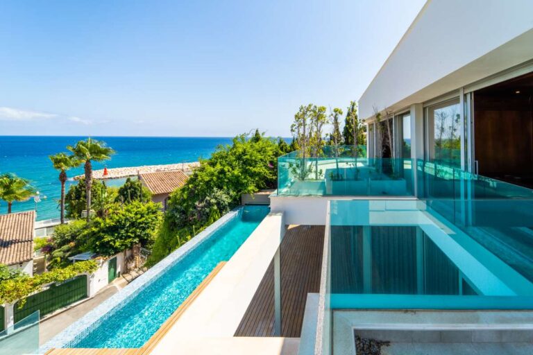 Infinity pool at a luxury villa in Calpe with panoramic Mediterranean Sea views, coastal surroundings and terrace access