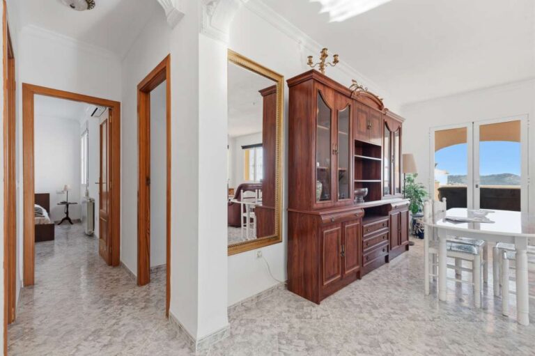 Interior hallway connecting rooms inside a villa in Calpe.