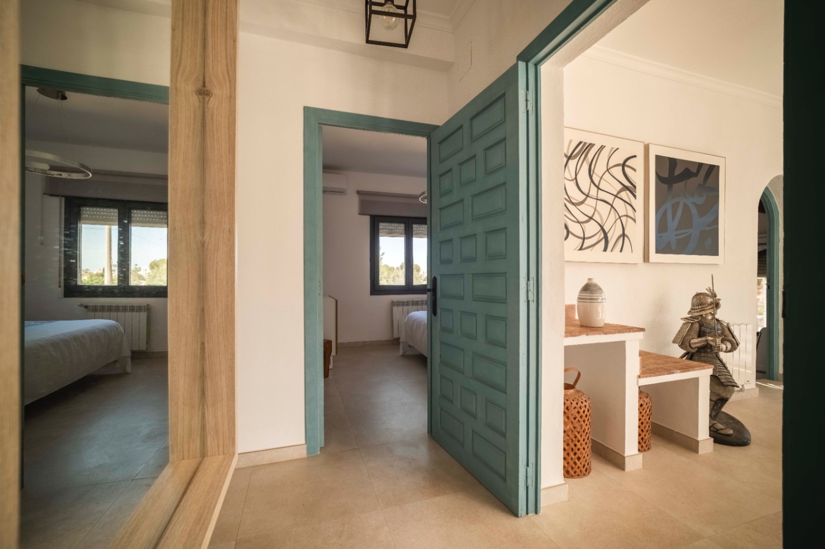 Interior hallway leading to rooms at renovated villa in Calpe