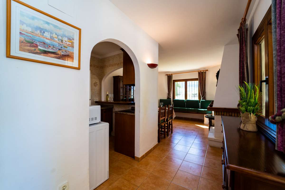 Interior hallway leading to the kitchen and living area inside a Mediterranean villa in Calpe.