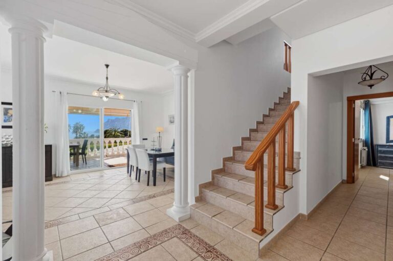 Interior staircase and entrance area inside a spacious villa in Calpe.