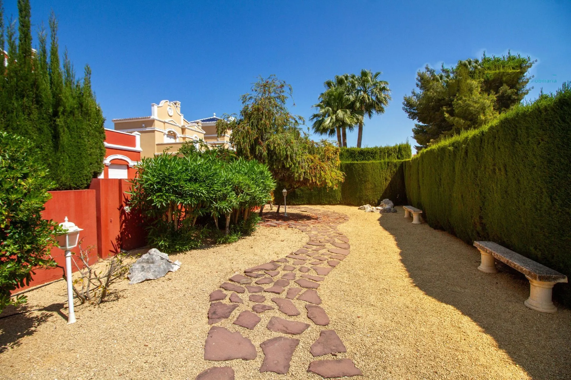 Landscaped communal garden near bungalow in La Vallesa Calpe`