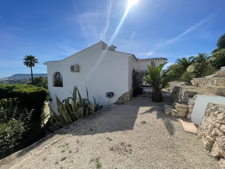 Landscaped garden with Mediterranean planting beside a villa in Empedrola, Calpe.
