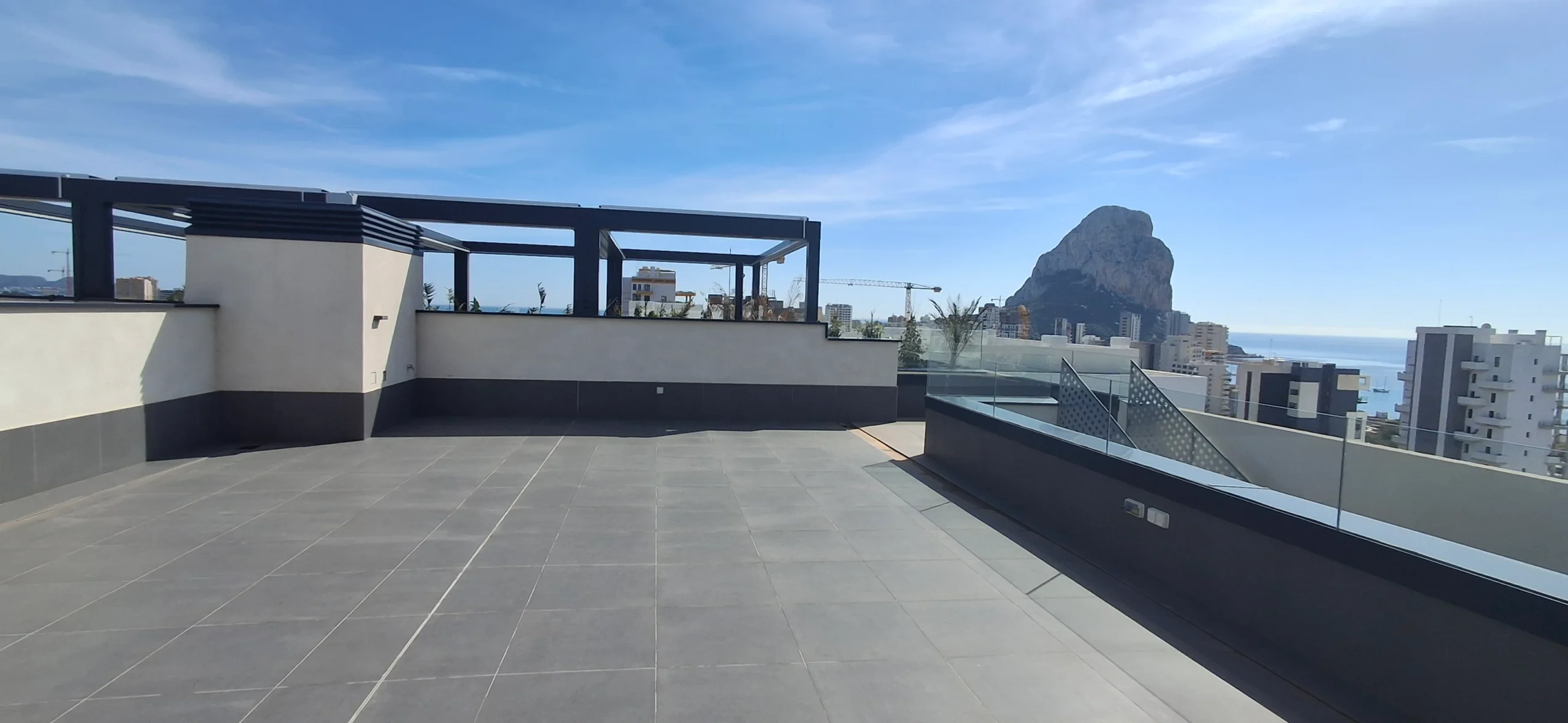 Large rooftop terrace with Peñón de Ifach views at luxury penthouse in Calpe