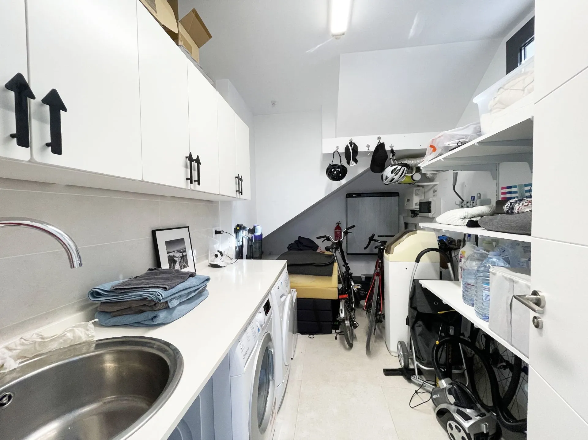 Laundry and storage room at modern villa in Calpe