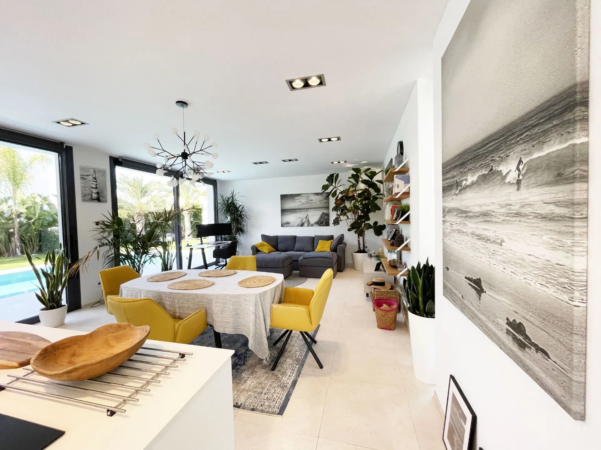 Living and dining area at modern villa near Arenal Beach in Calpe