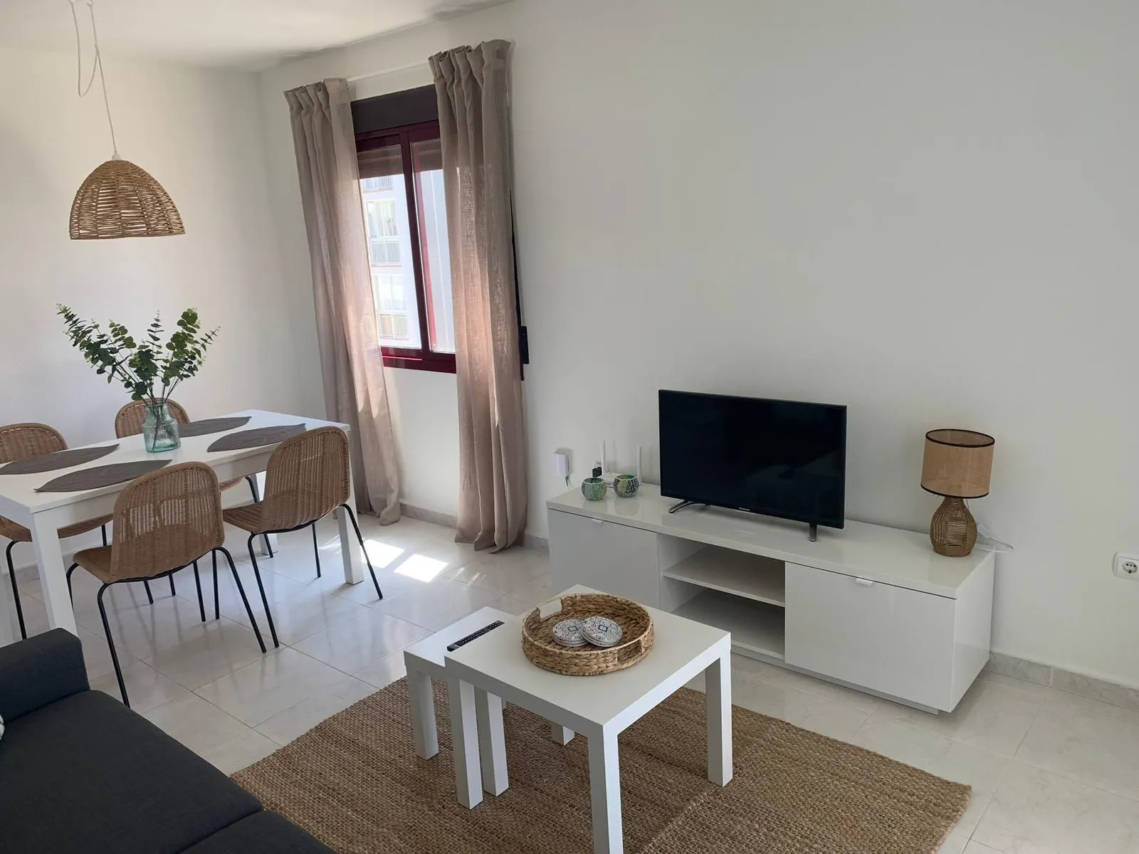 Living and dining area inside duplex penthouse in La Fossa, Calpe