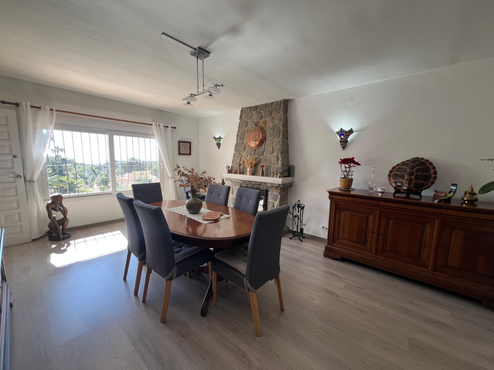 Living and dining area with sea views at villa in Buena Vista Benissa