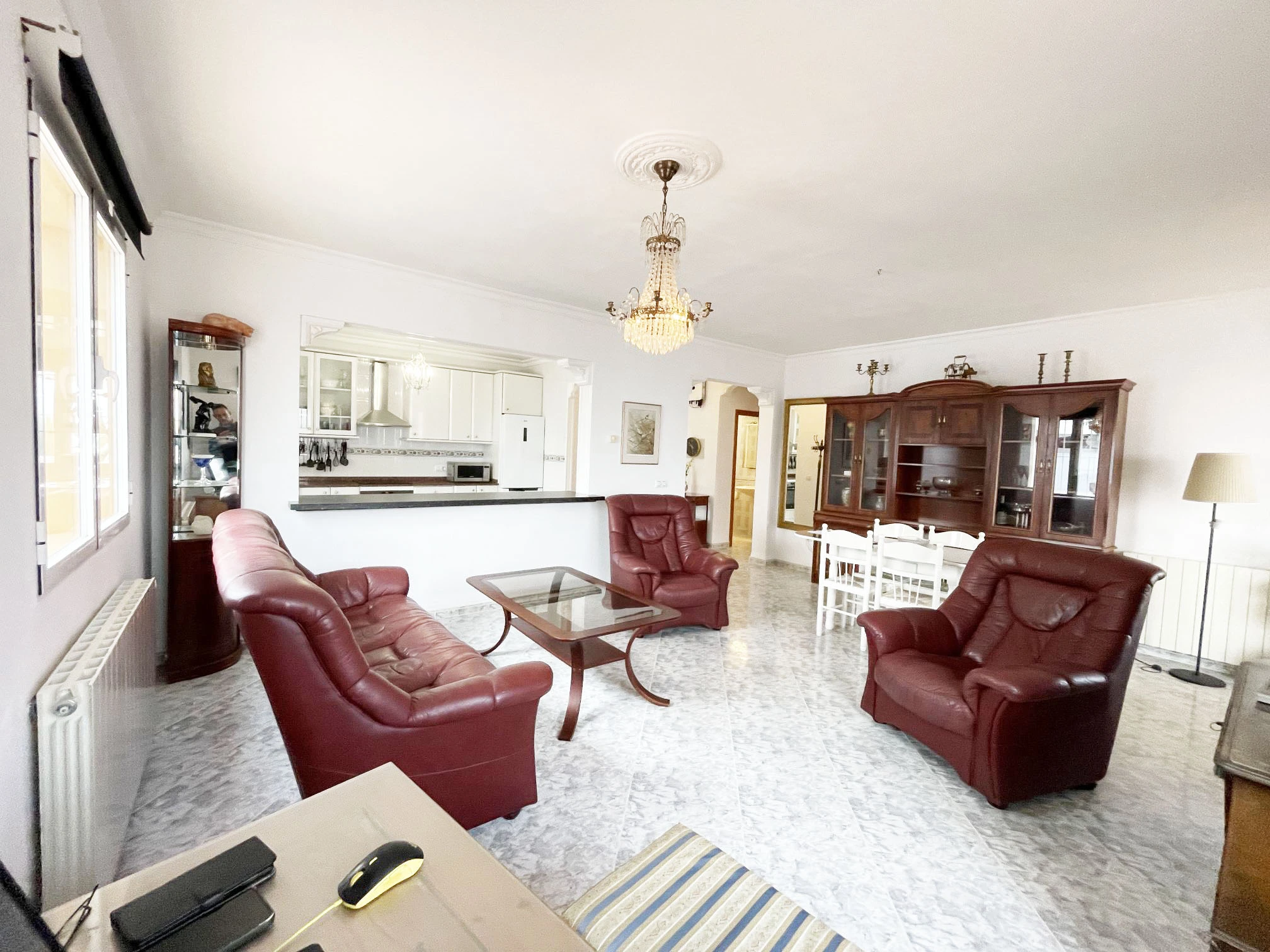 Living and dining room with open kitchen at detached villa in Calpe